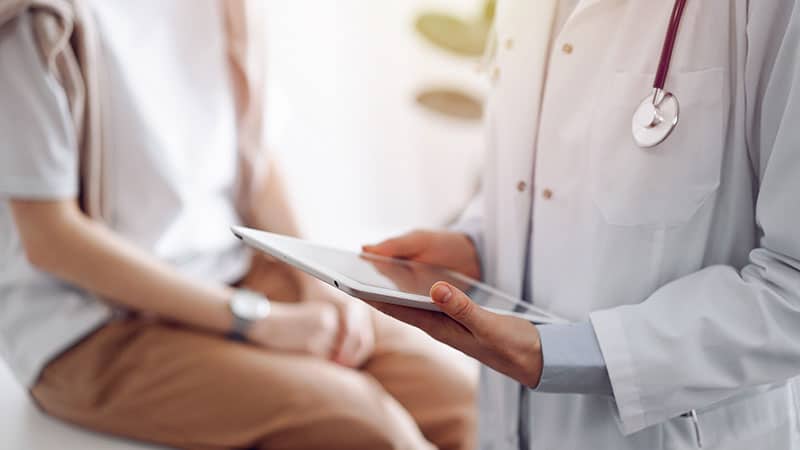Doctor speaking with patient